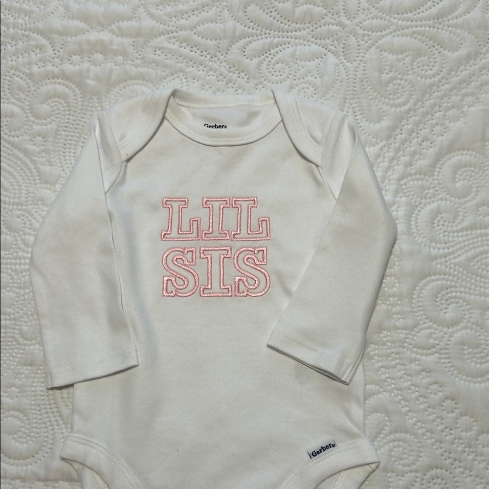 Gerber White Onesie with Pink 'Lil Sis' Design